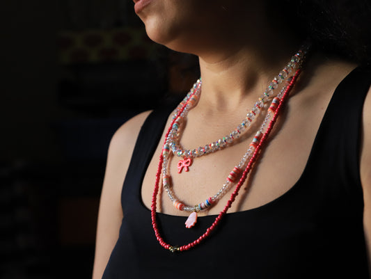 Coral Candy – Multi-Strand Bead Necklace with Bow & Shell Charms