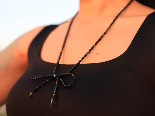 Noir Bow – Handcrafted Black Crystal Bow Necklace