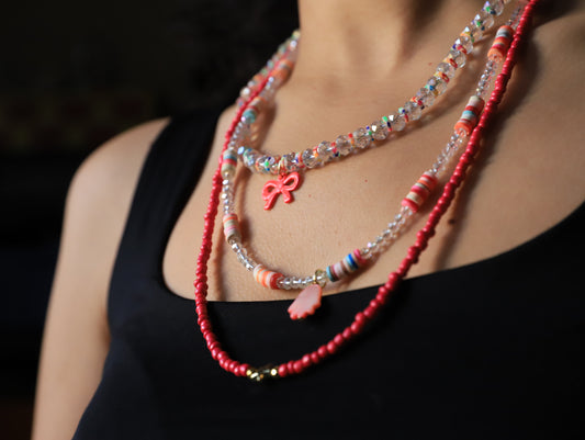 Coral Candy – Multi-Strand Bead Necklace with Bow & Shell Charms